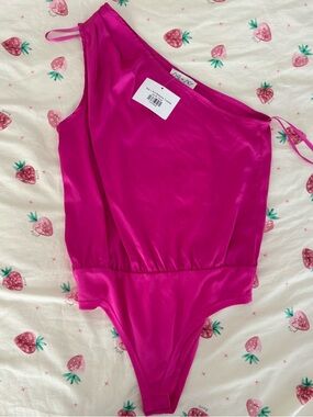 she + sky pink bodysuit !